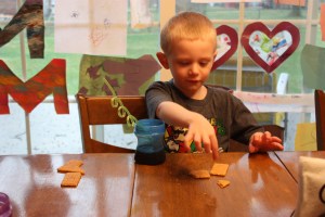 (A simplified version of communion, or as J calls it "chameleon" for this year--crackers and juice)